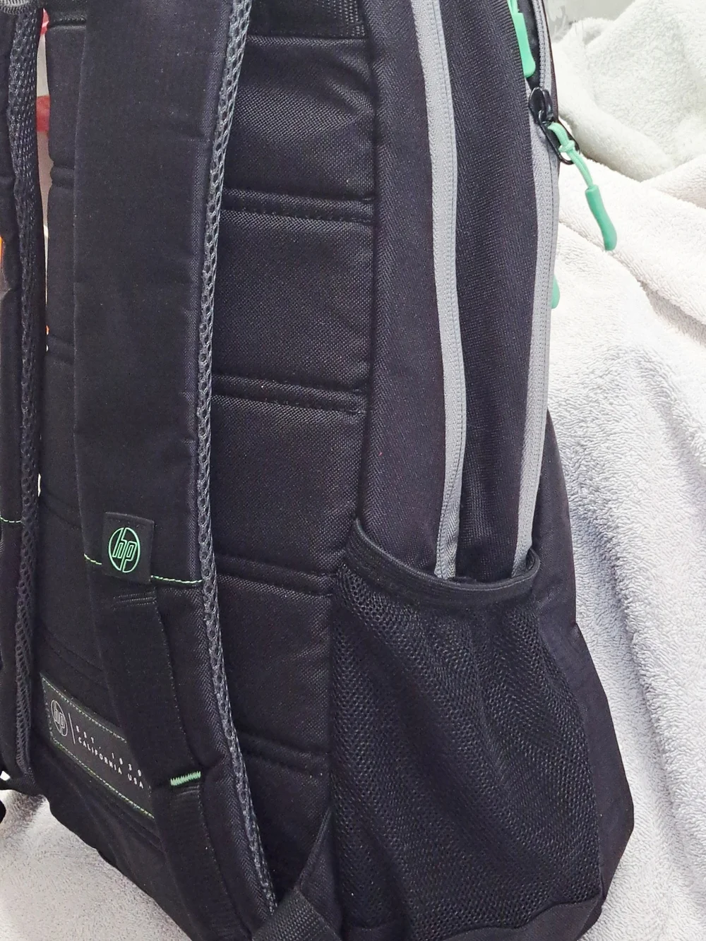 HP Black Laptop Backpack with Green Accents